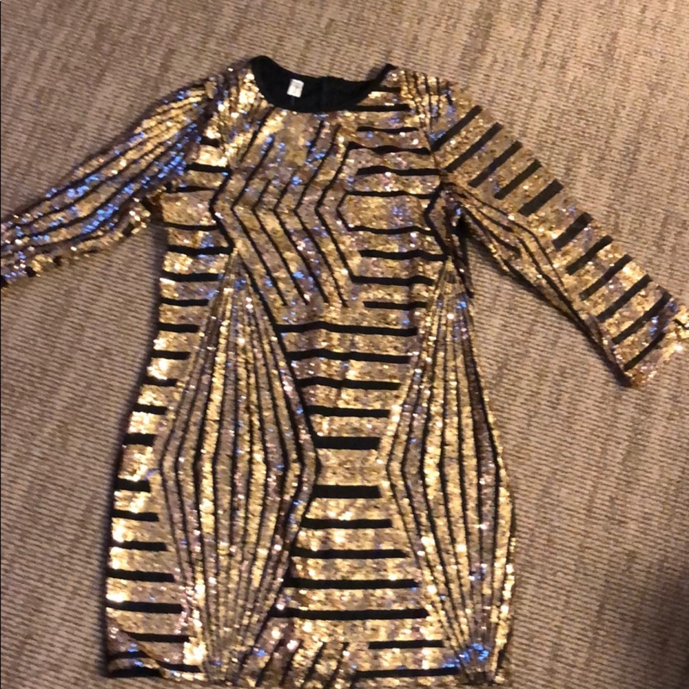 Woman’s size L/XL gold sparkly dress